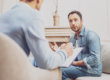 man meets with therapist at florida dual diagnosis rehab program